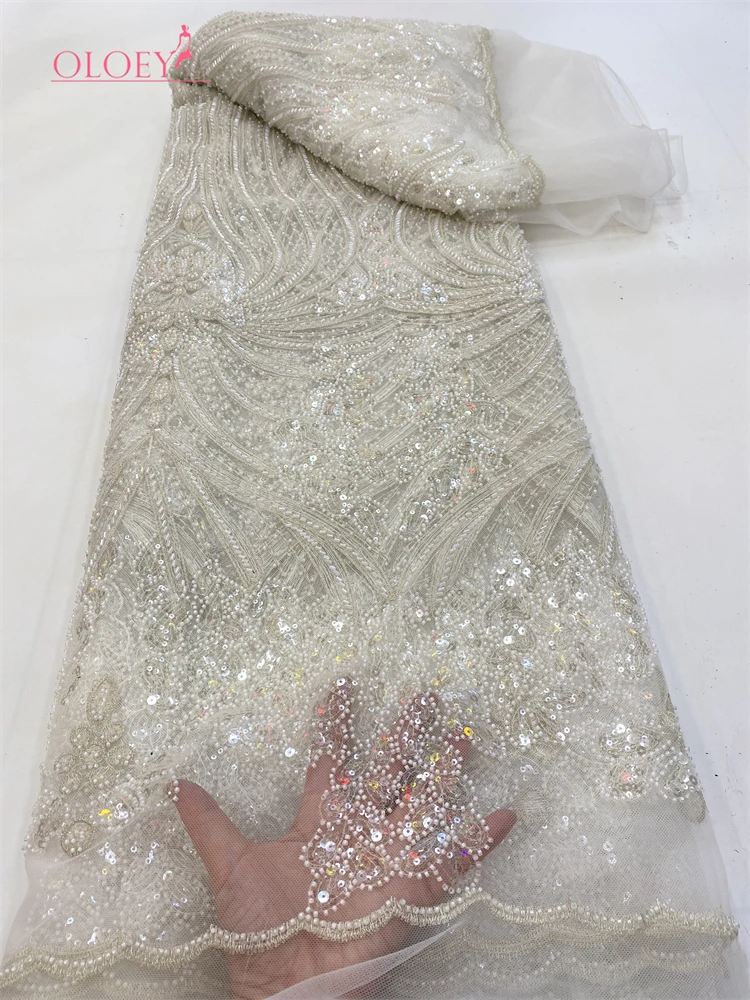 OLOEY Latest Hot Sale New High-End Luxury French Embroidery Heavy Lace Fabric African Nigerian With Sequins Fabric For Wedding
OLOEY Latest Hot Sale New High-End Luxury French Embroidery Heavy Lace Fabric African Nigerian With Sequins Fabric For Wedding