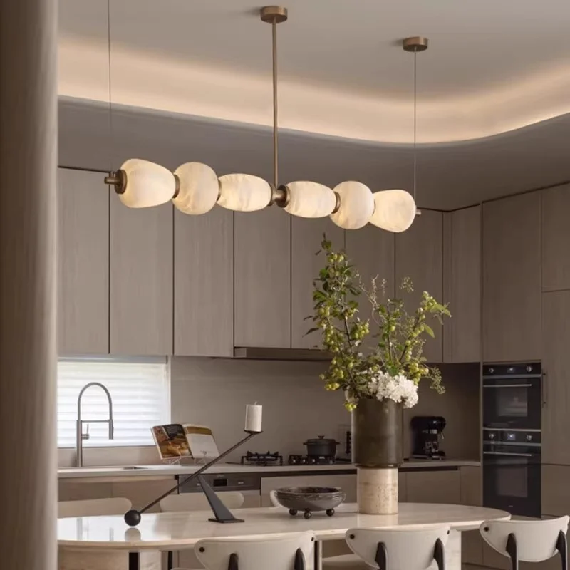 Light luxury copper marble chandelier designer, long restaurant bar learning lamp, high-end front desk chandelier
Light luxury copper marble chandelier designer, long restaurant bar learning lamp, high-end front desk chandelier