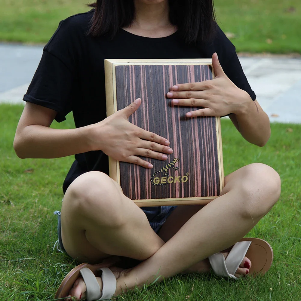 Cajon Drum Designed for Portability and Performance Exceptional Resonance from Embedded Strings Includes Handy Carry Bag
Cajon Drum Designed for Portability and Performance Exceptional Resonance from Embedded Strings Includes Handy Carry Bag
