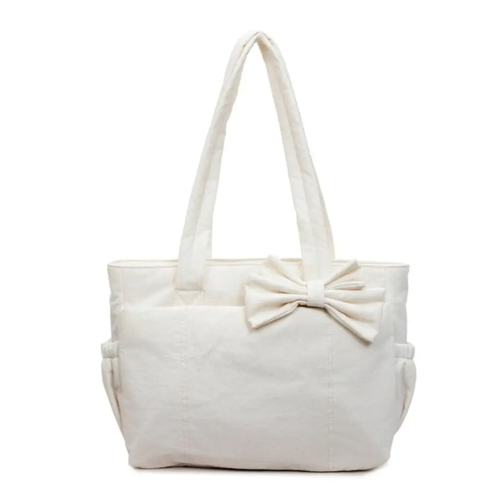 Korean Style Bow Tote Bag Solid Color Simple Cotton Padded Shoulder Bag Large Capacity Fashion Nylon Handbag Travel Bag
Korean Style Bow Tote Bag Solid Color Simple Cotton Padded Shoulder Bag Large Capacity Fashion Nylon Handbag Travel Bag