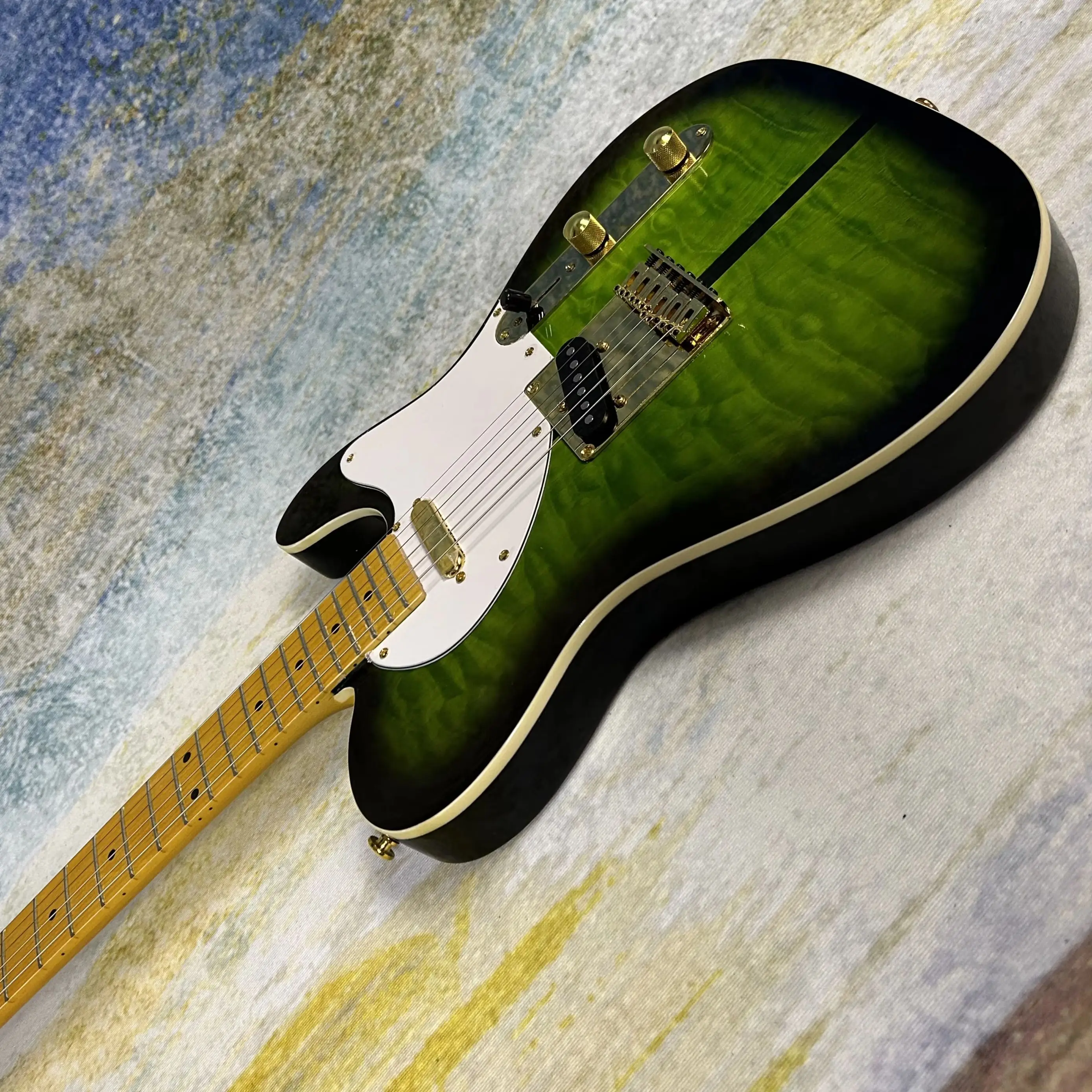 Green Burst Electric Guitar Cloud Maple Top Golden Hardware
Green Burst Electric Guitar Cloud Maple Top Golden Hardware