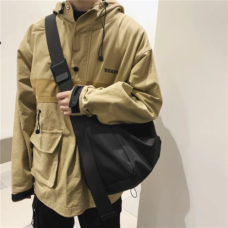 Large Capaci Crossbody Bapa Men's Casual Sle Nylon Material Zipper Closure Dumpling ape Soft Handle for Youth
Large Capaci Crossbody Bapa Men's Casual Sle Nylon Material Zipper Closure Dumpling ape Soft Handle for Youth