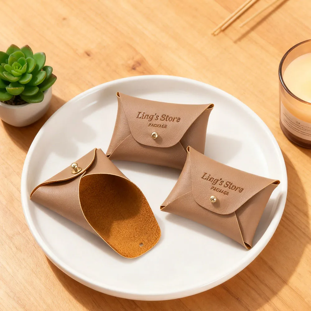 50/100 шт., коричневая кожаная сумка с заклепками и логотипом, органайзер для ювелирных изделий из искусственной кожи, серьги, жемчужные кольца, кулон, ожерелье для хранения
50/100 шт., коричневая кожаная сумка с заклепками и логотипом, органайзер для ювелирных изделий из искусственной кожи, серьги, жемчужные кольца, кулон, ожерелье для хранения