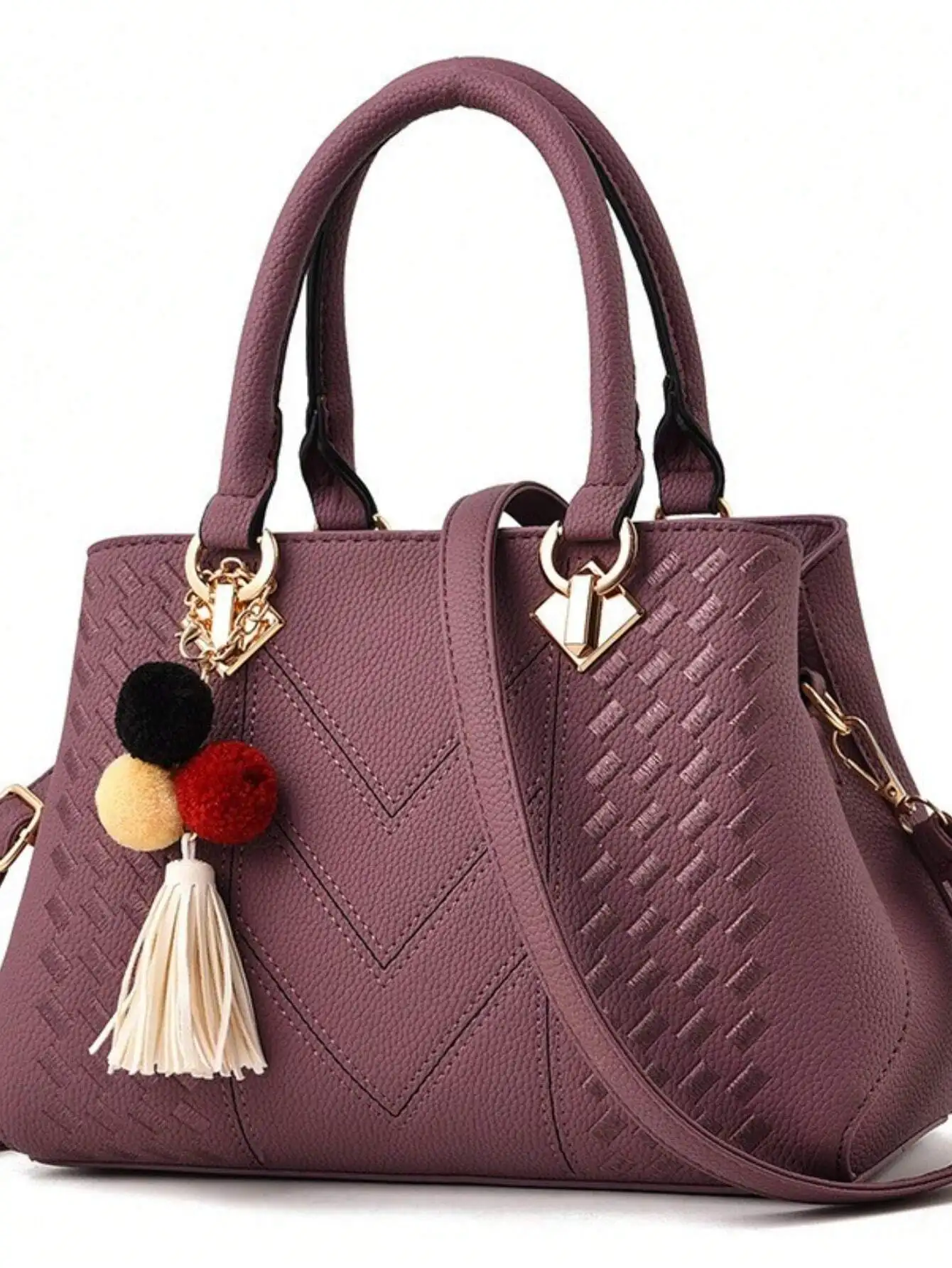 Purple Textured Top-Handle Handbag with Pom-Pom Tassel Charm
Purple Textured Top-Handle Handbag with Pom-Pom Tassel Charm