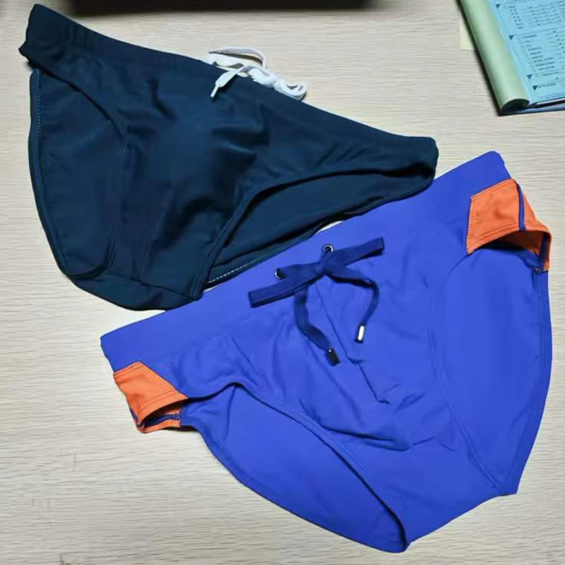 Combination spot real shot original camera solid color small triangle swimming trunks with cup quick-drying beach briefsUXH096-1
Combination spot real shot original camera solid color small triangle swimming trunks with cup quick-drying beach briefsUXH096-1