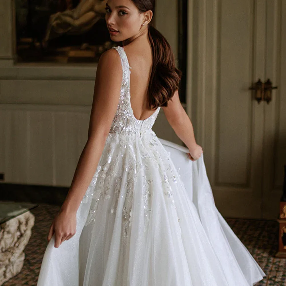 Elegant Deep V Neck Wedding Dresses Spaghetti Straps Backless Bridal Grown A Line Pearls Applique Customized Vestidos De Novia
Elegant Deep V Neck Wedding Dresses Spaghetti Straps Backless Bridal Grown A Line Pearls Applique Customized Vestidos De Novia