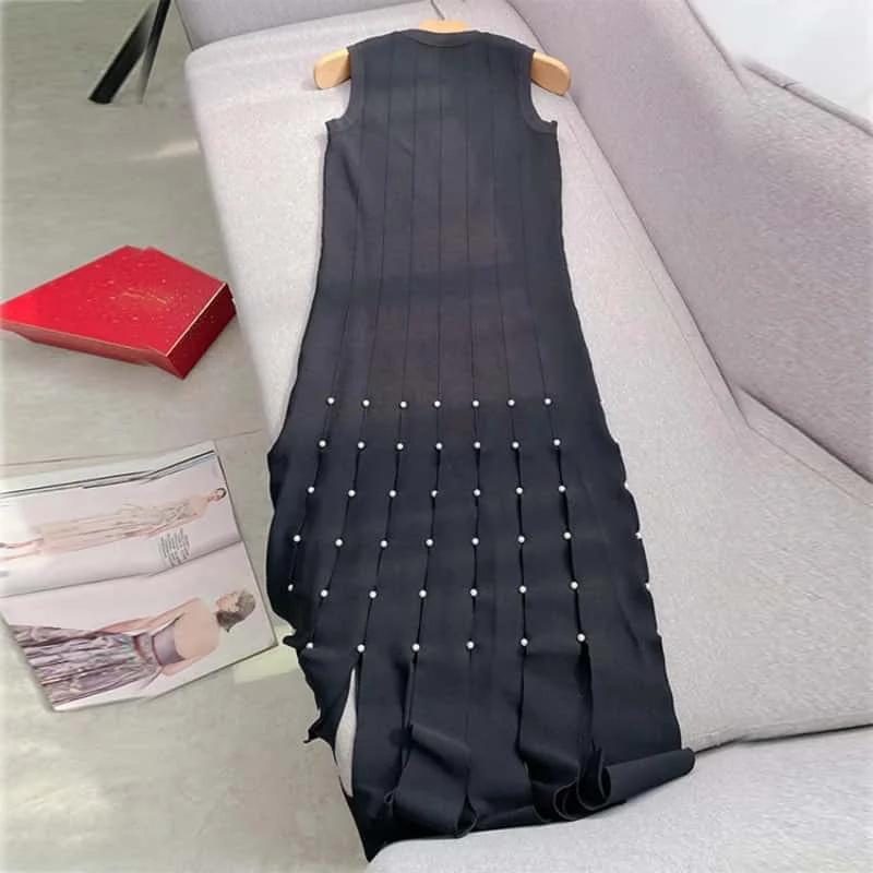 Black Knitted Dress For Women O Neck Sleeveless 2025 New Temperament Slim Elegant Pearl Hollow Out Female Party Dresses Rrobe
Black Knitted Dress For Women O Neck Sleeveless 2025 New Temperament Slim Elegant Pearl Hollow Out Female Party Dresses Rrobe