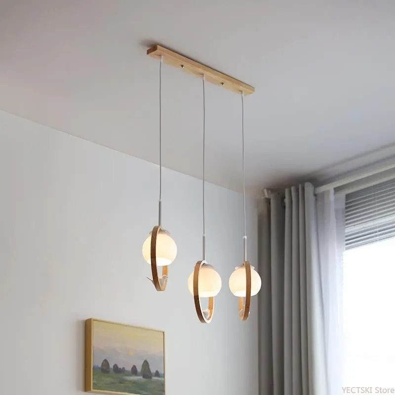 GHJUYIOL New Japanese Log Chandelier Simple Bedroom Headboard Nordic Creative Bar Three Heads Dining Room Chandelier
GHJUYIOL New Japanese Log Chandelier Simple Bedroom Headboard Nordic Creative Bar Three Heads Dining Room Chandelier
