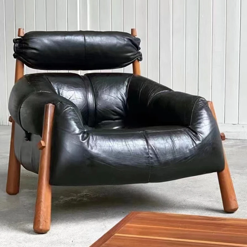 Medieval Atlan chair, Nordic retro oil wax leather living room, creative art villa cigar chair
Medieval Atlan chair, Nordic retro oil wax leather living room, creative art villa cigar chair