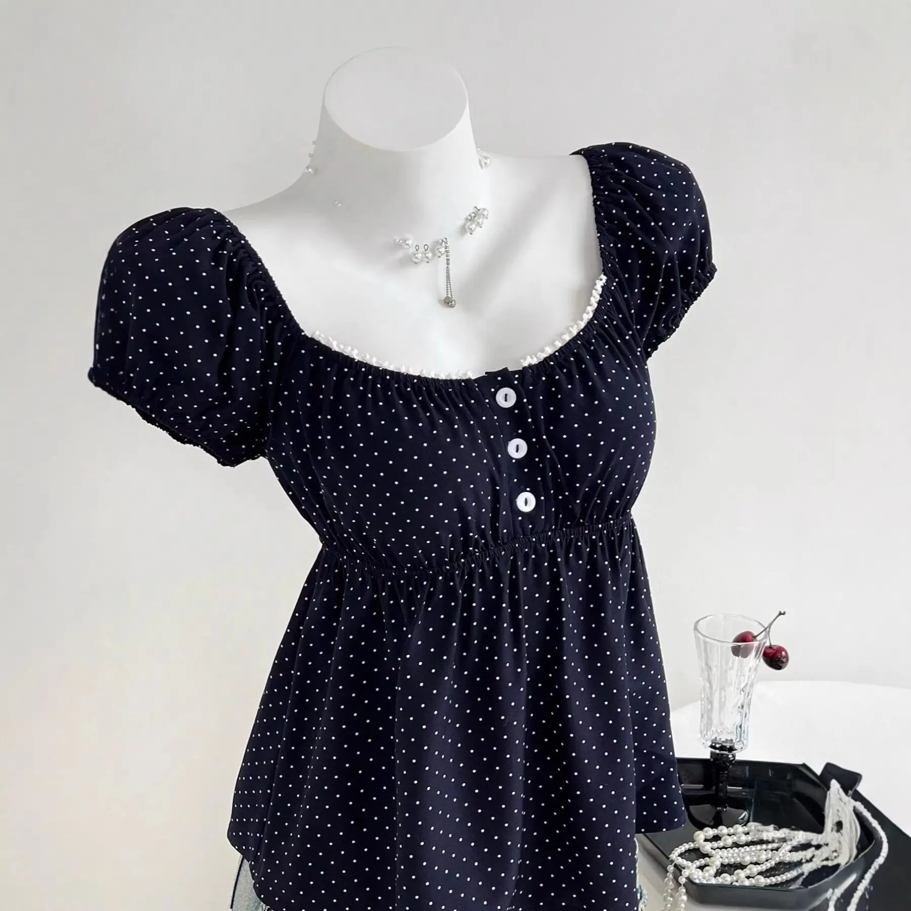 Slim Fit Polka Dot Top with Three Buttons Skirt Design Fashionable Waist Shaping Short Sleeve Lantern Sleeve Women's Shirt
Slim Fit Polka Dot Top with Three Buttons Skirt Design Fashionable Waist Shaping Short Sleeve Lantern Sleeve Women's Shirt