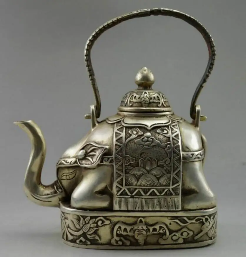 Copper Statue Collectible ! Decorated Old Handwork Tibet Silver Carve Flower Elephant Tea pot
Copper Statue Collectible ! Decorated Old Handwork Tibet Silver Carve Flower Elephant Tea pot