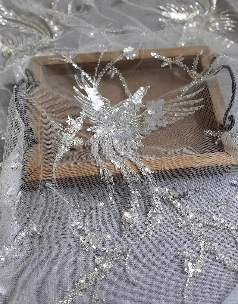 1yard new soft mesh fabrics for clothing Phoenix Silver Thread Embroidery Nail Bead Embroidery telas Wedding Dress fabric
1yard new soft mesh fabrics for clothing Phoenix Silver Thread Embroidery Nail Bead Embroidery telas Wedding Dress fabric