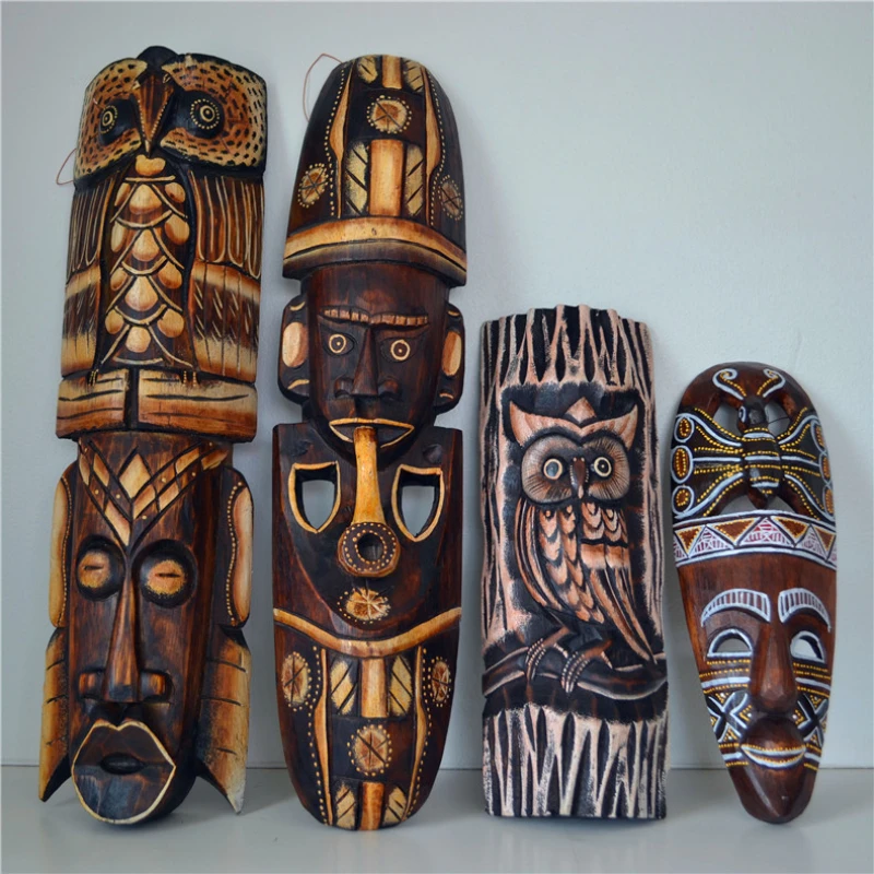 Solid wood carving African mask hanging ornaments hand-painted decoration on the wall
Solid wood carving African mask hanging ornaments hand-painted decoration on the wall