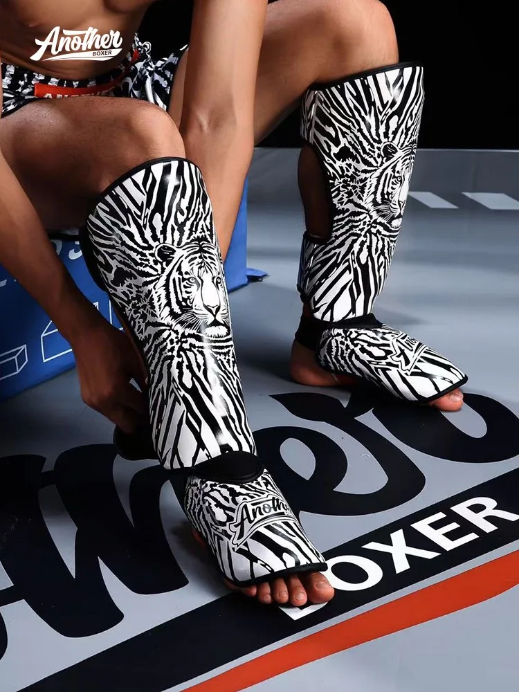 Shin Pads Guards Muay Thai Boxing Kick Leg Protective Gear Tiger Leather MMA Sparring Kickboxing Fight Training Shin Guard Black
Shin Pads Guards Muay Thai Boxing Kick Leg Protective Gear Tiger Leather MMA Sparring Kickboxing Fight Training Shin Guard Black
