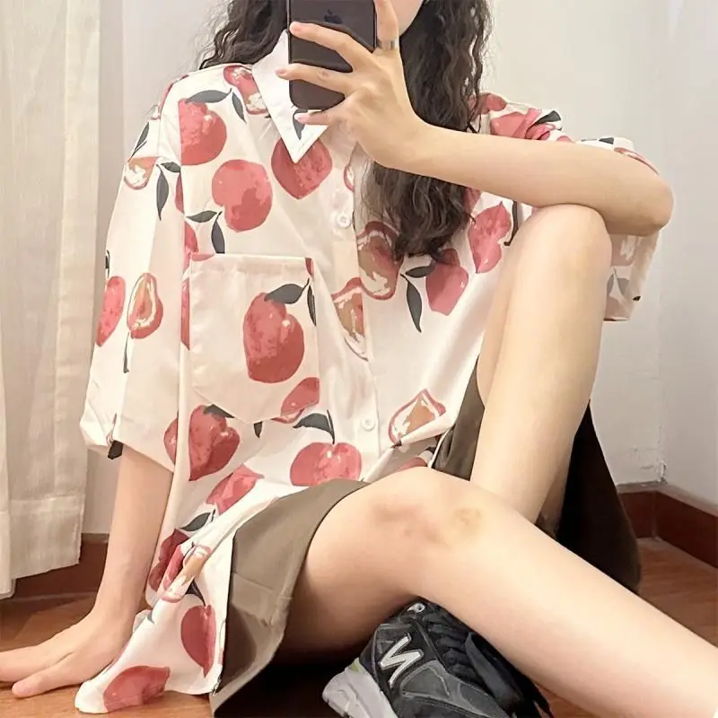 New original trendy brand peach all over printed short sleeved shirt for women summer casual fashion loose and versatile shirt
New original trendy brand peach all over printed short sleeved shirt for women summer casual fashion loose and versatile shirt