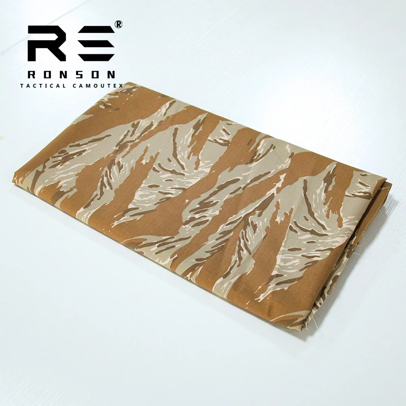 hot sale 50% Nylon 50% Cotton Ripstop fabric tiger strip desert/blue Camouflage tactical fabric use for uniform in stock
hot sale 50% Nylon 50% Cotton Ripstop fabric tiger strip desert/blue Camouflage tactical fabric use for uniform in stock