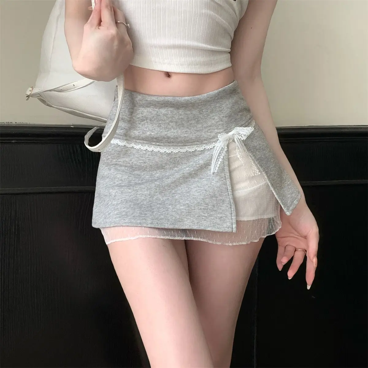 New Summer Ultra-short Skirt for Women with Bow Tie Design, Lace and Hemming, and Hip-hugging Style
New Summer Ultra-short Skirt for Women with Bow Tie Design, Lace and Hemming, and Hip-hugging Style