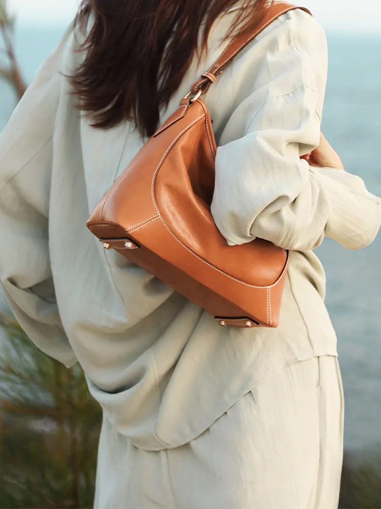 Сумка из воловьей кожи растительного дубления, сумка-ведро для воды большой вместимости, женская сумка через плечо, женская сумка Caesar из натуральной кожи
Сумка из воловьей кожи растительного дубления, сумка-ведро для воды большой вместимости, женская сумка через плечо, женская сумка Caesar из натуральной кожи