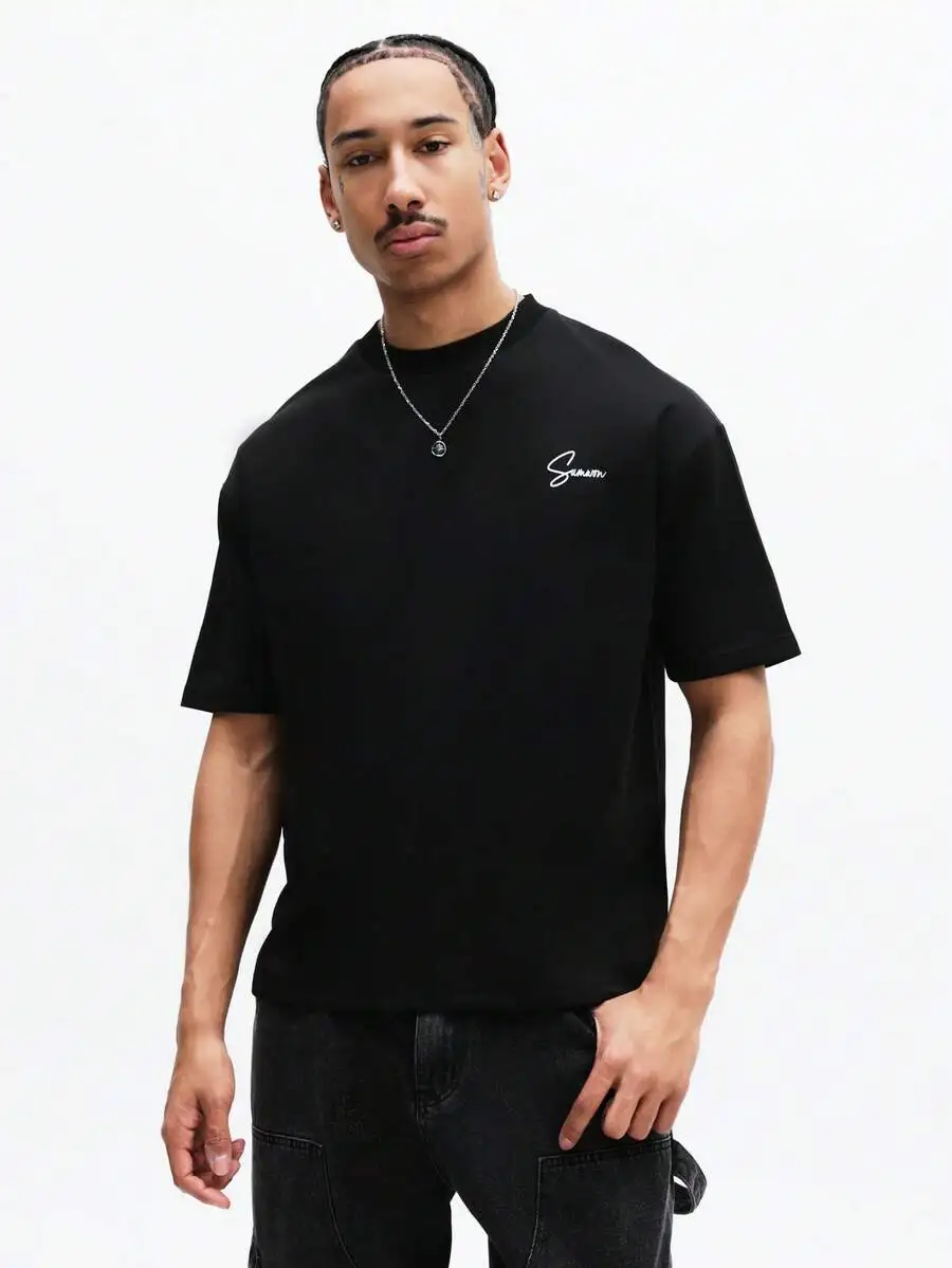 Casual Black Oversized Crew Neck Tee With Small Script Logo On Chest
Casual Black Oversized Crew Neck Tee With Small Script Logo On Chest