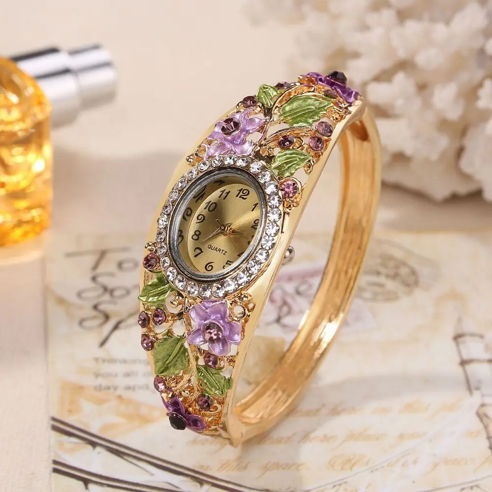 Винтажные часы Rich In Flowers с круглым циферблатом, браслетом из страз и кварцевым механизмом, универсальный дизайн, украшенный кристаллами.
Винтажные часы Rich In Flowers с круглым циферблатом, браслетом из страз и кварцевым механизмом, универсальный дизайн, украшенный кристаллами.