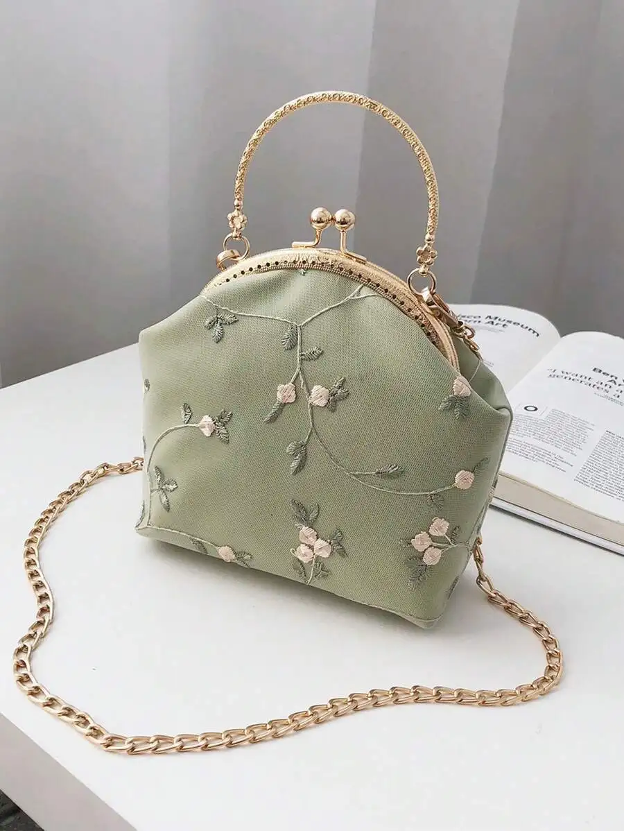 Mint Green Embroidered Floral Frame Handbag with Gold Chain Strap
Mint Green Embroidered Floral Frame Handbag with Gold Chain Strap