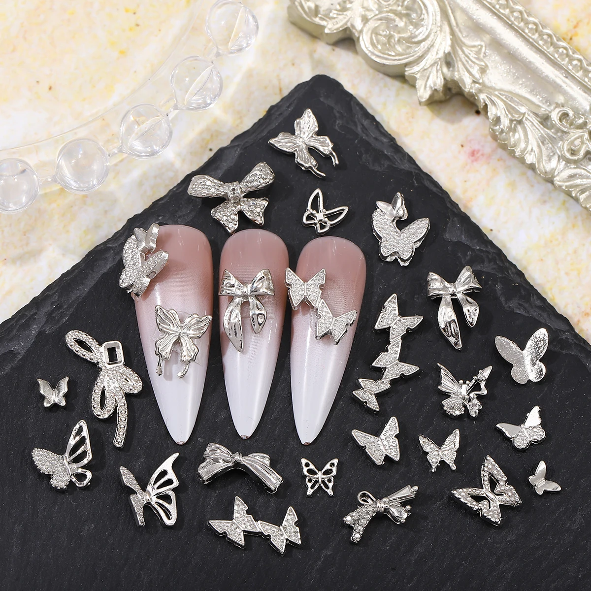 50 шт. серебряные трехмерные бабочки, ленточные банты, Случайные Смешанные японские милые простые Стильные искусственные украшения
50 шт. серебряные трехмерные бабочки, ленточные банты, Случайные Смешанные японские милые простые Стильные искусственные украшения