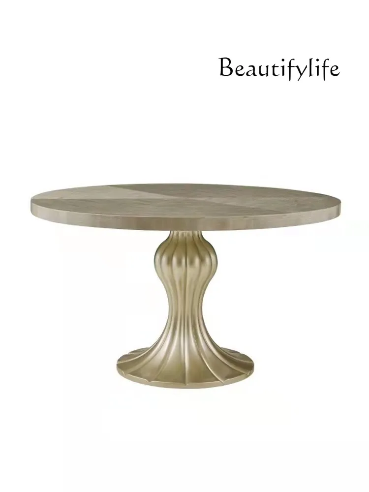 American light luxury fashion round table French champagne gold round solid wood dining table
American light luxury fashion round table French champagne gold round solid wood dining table