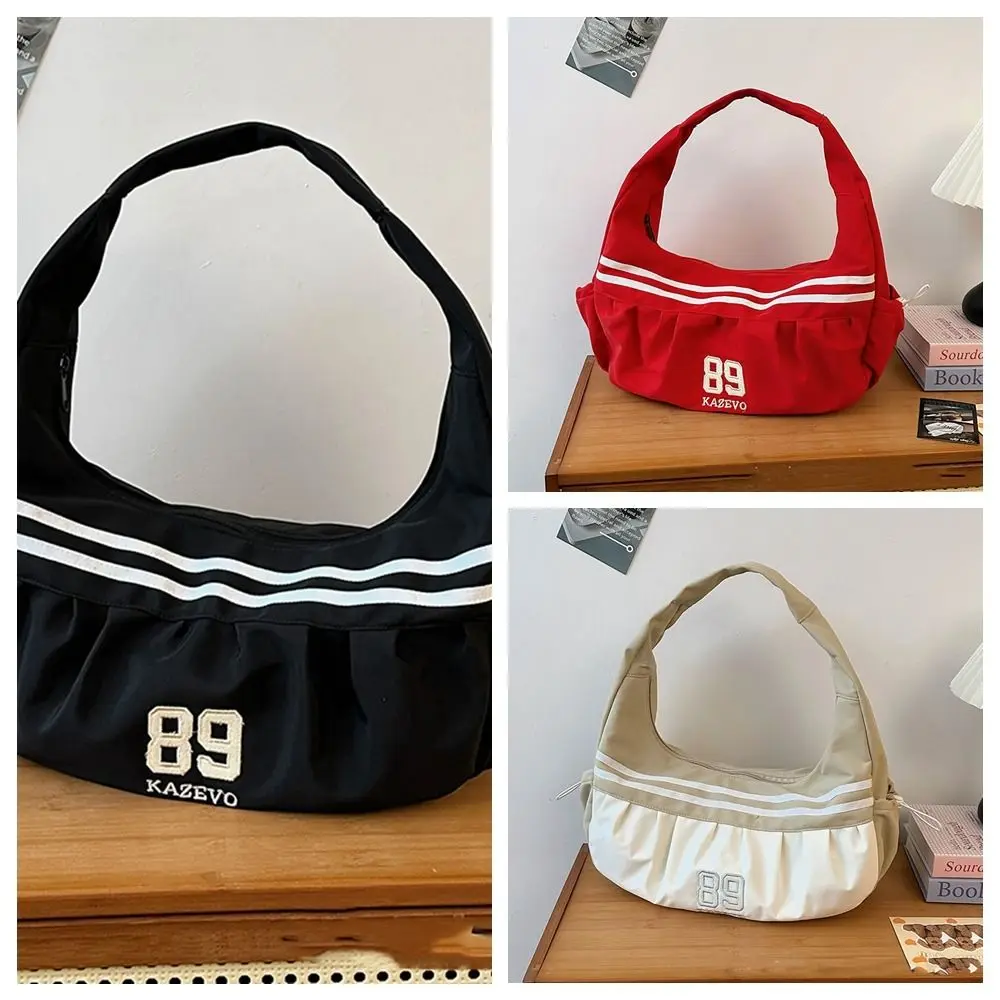 Versatile Korean Style Nylon Shoulder Bag Oxford Cloth Cloud Bag Stripe Underarm Bag Retro Large Capacity Sports Handbag Girls
Versatile Korean Style Nylon Shoulder Bag Oxford Cloth Cloud Bag Stripe Underarm Bag Retro Large Capacity Sports Handbag Girls