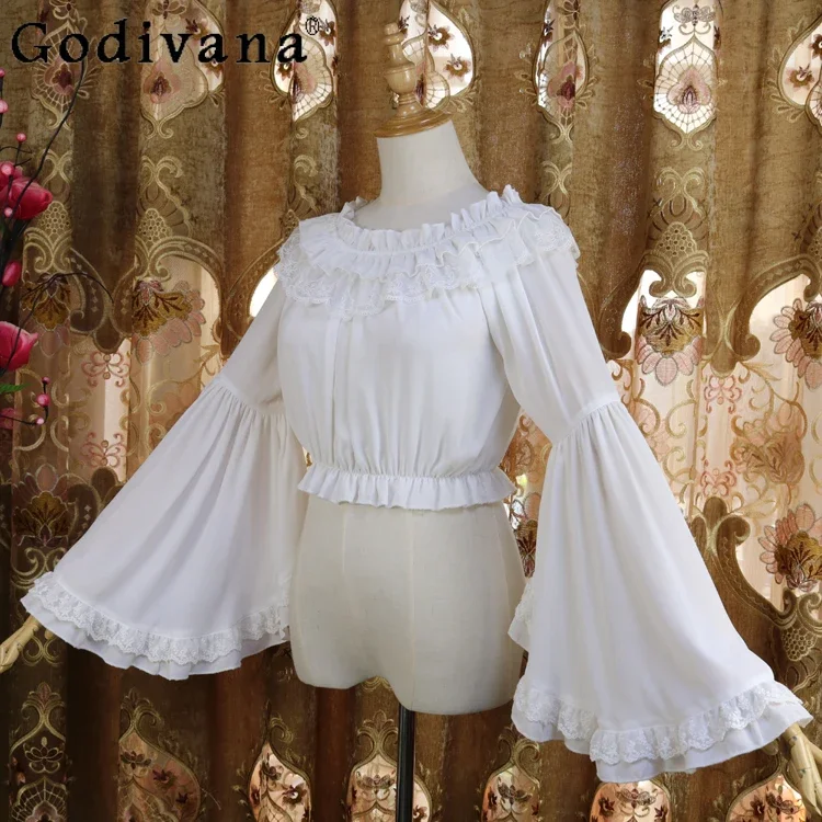 Japanese Lolita Shirt Girly Harajuku Cute Slash Neck Ruffles Bell Sleeve White Bottoming Chiffon Blouse Women Super Short Top
Japanese Lolita Shirt Girly Harajuku Cute Slash Neck Ruffles Bell Sleeve White Bottoming Chiffon Blouse Women Super Short Top