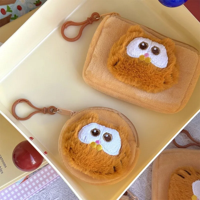 Cartoon Garfield Plush Keychain Cute Portable Mini Coin Purse Student Earphones Storage Bag Girl Backpack Pendant Festival Gift
Cartoon Garfield Plush Keychain Cute Portable Mini Coin Purse Student Earphones Storage Bag Girl Backpack Pendant Festival Gift