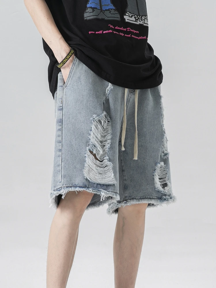 Comfortable and Stylish Men's Denim Shorts with Elastic Waistband and Distressed Design
Comfortable and Stylish Men's Denim Shorts with Elastic Waistband and Distressed Design