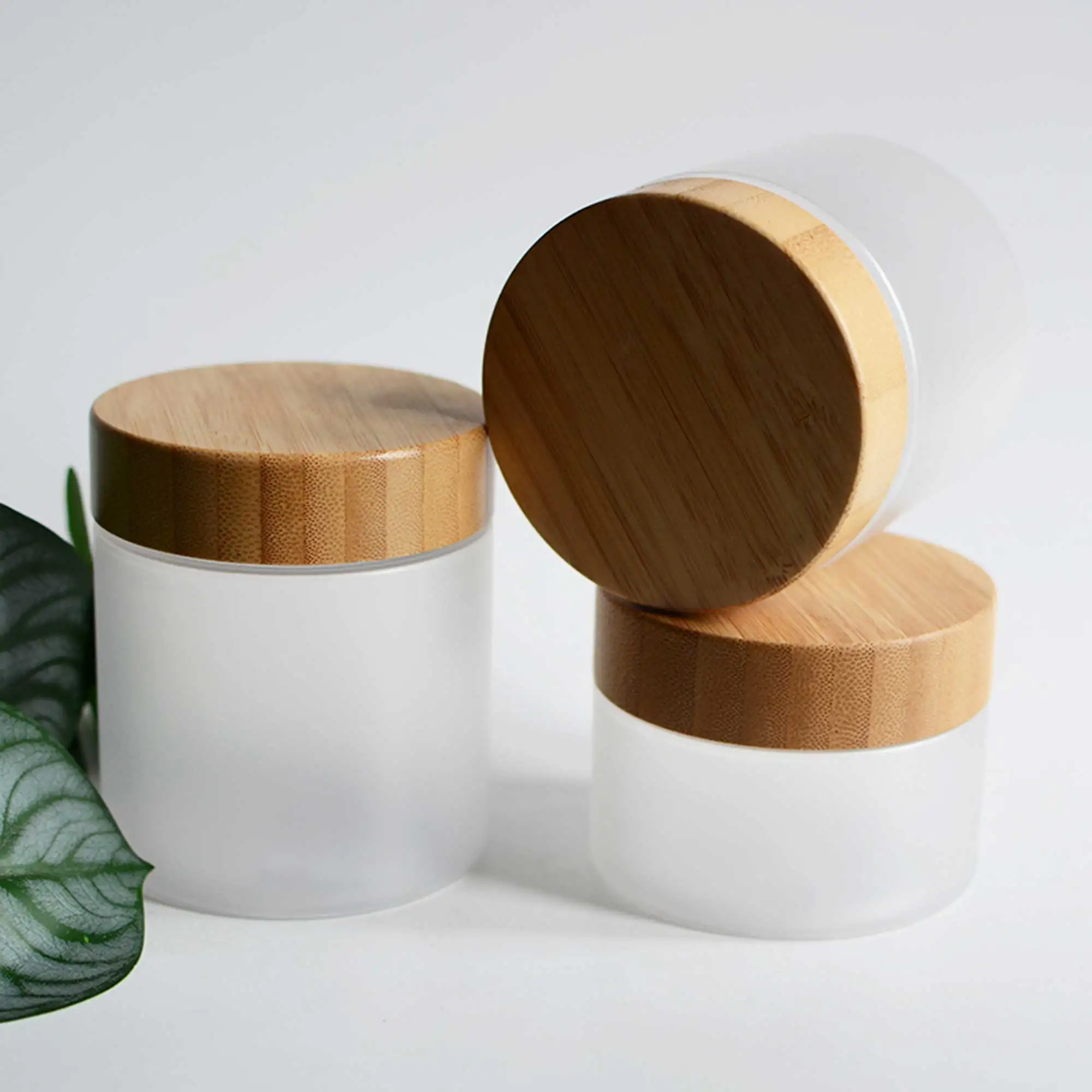 Plastic Body Butter Face Cream Jar Round Shape Clear Frosted PET Plastic Face and Body Cream With Bamboo Cap Cosmetic Packaging
Plastic Body Butter Face Cream Jar Round Shape Clear Frosted PET Plastic Face and Body Cream With Bamboo Cap Cosmetic Packaging