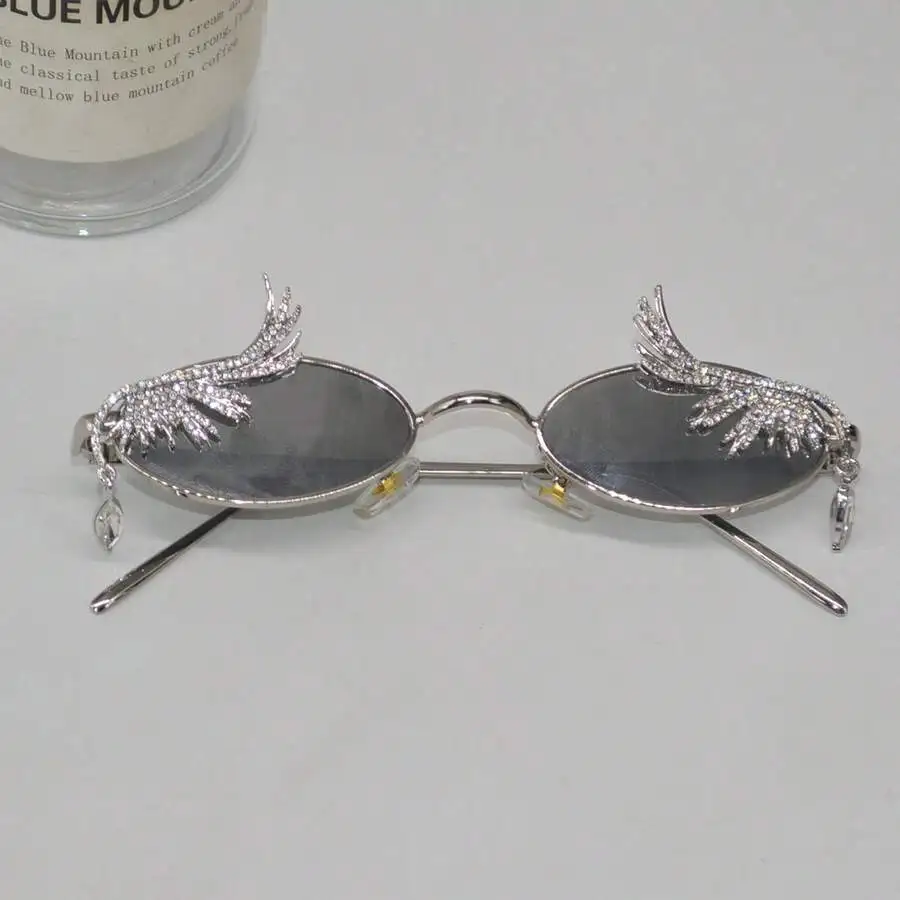 Creative Rhinestone Crystal Wing Oval Fashion Glasses With Water Droplet Decoration
Creative Rhinestone Crystal Wing Oval Fashion Glasses With Water Droplet Decoration