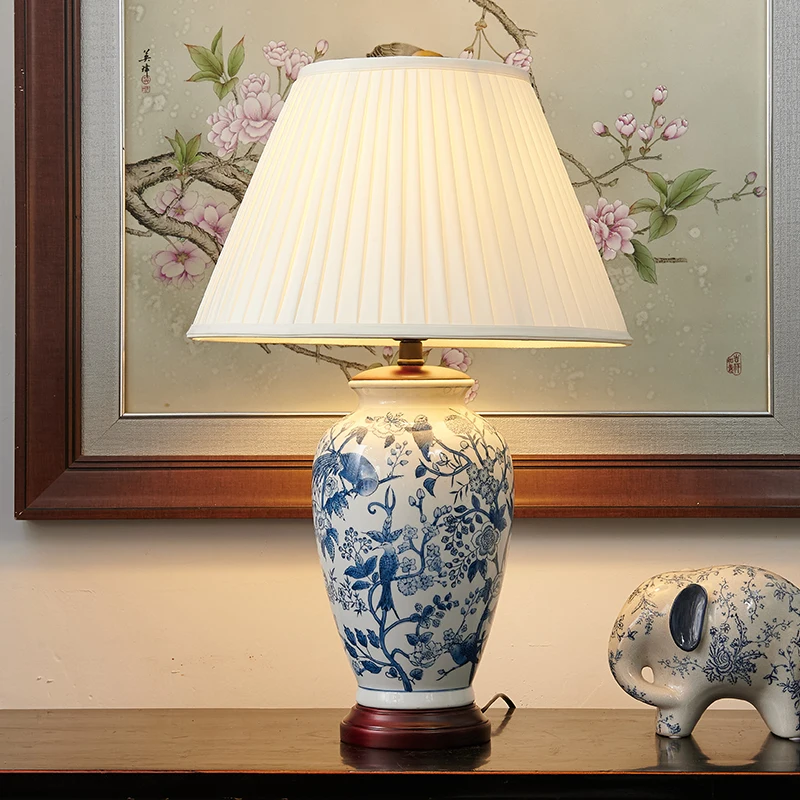 Chinese bedroom bedside table lamp American French retro creative living room blue and white ceramic table lamp
Chinese bedroom bedside table lamp American French retro creative living room blue and white ceramic table lamp