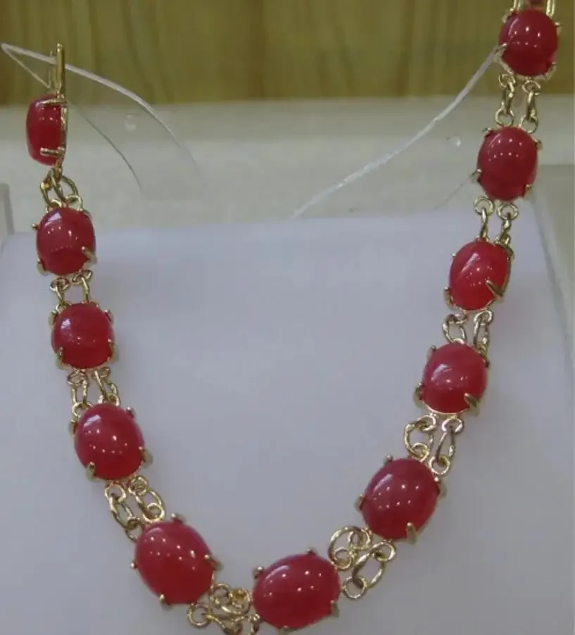 Women's fashion gold plated egg shaped red jade bracelet
Women's fashion gold plated egg shaped red jade bracelet