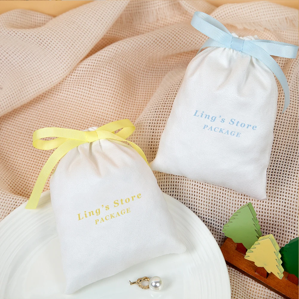 50/100Pcs Custom Logo White Jewelry Flannel Bag Suede Velvet Gift Packaging Drawstring Pouch Cosmetic Ring Pocket Wedding Favors
50/100Pcs Custom Logo White Jewelry Flannel Bag Suede Velvet Gift Packaging Drawstring Pouch Cosmetic Ring Pocket Wedding Favors
