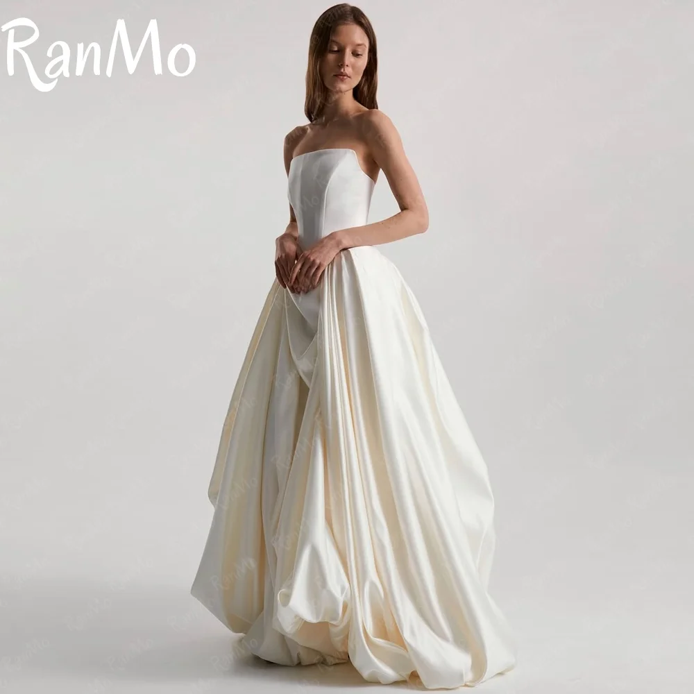 Ranmo Изысканное свадебное платье трапециевидной формы, элегантное свадебное платье без бретелек, атласное платье без рукавов длиной до пола, индивидуальное платье Vestidos De Novia
Ranmo Изысканное свадебное платье трапециевидной формы, элегантное свадебное платье без бретелек, атласное платье без рукавов длиной до пола, индивидуальное платье Vestidos De Novia