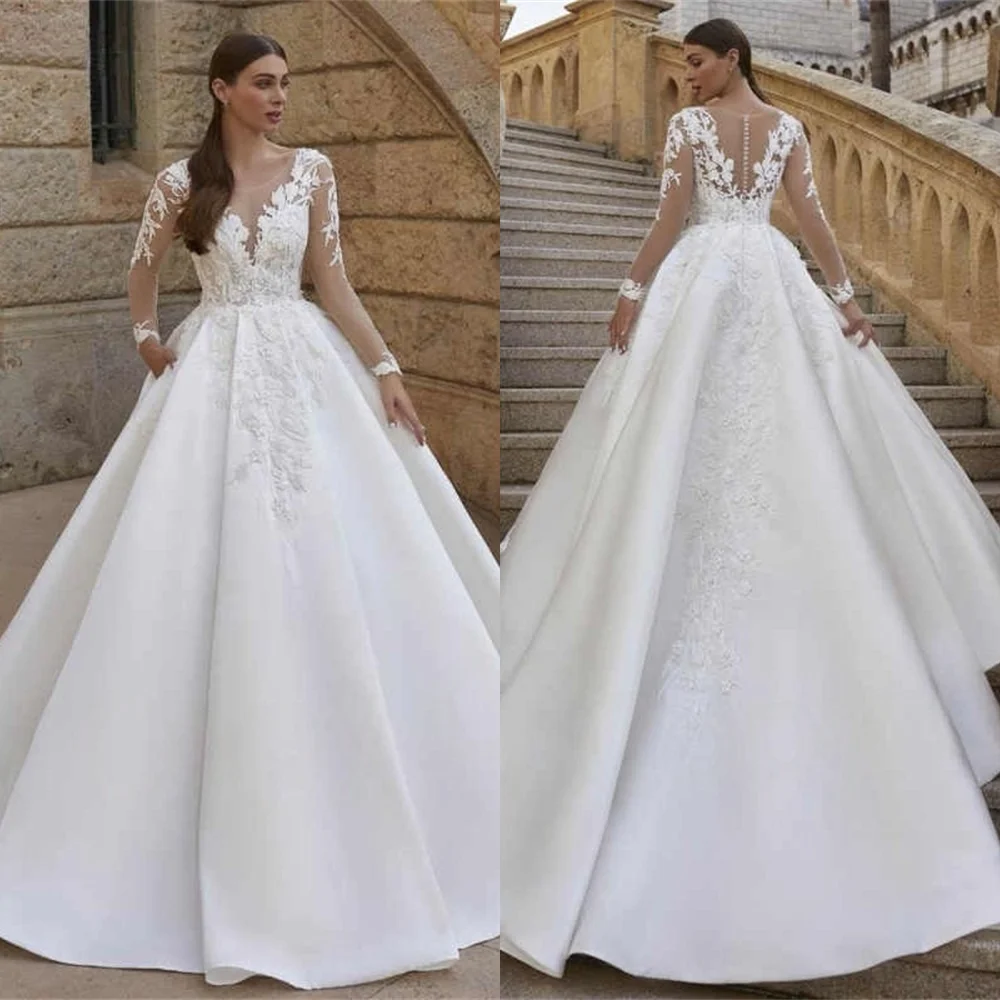 Customized Elegant White Satin Wedding Dress Exquisite Crew Neck Long Sleeves Bridal Gowns Chapel Train Buttons Back Dress
Customized Elegant White Satin Wedding Dress Exquisite Crew Neck Long Sleeves Bridal Gowns Chapel Train Buttons Back Dress