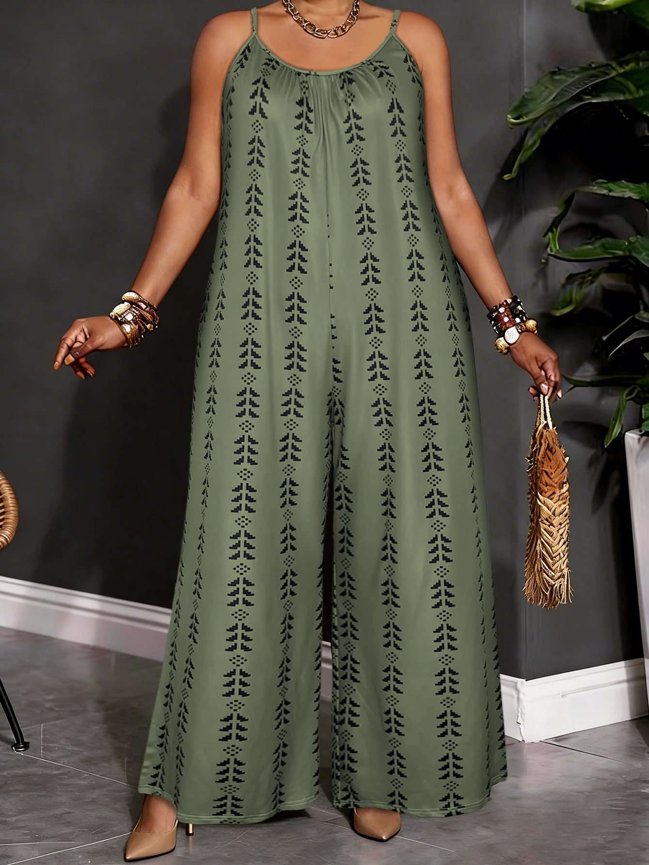 Plus Size Olive Green Geometric Print Spaghetti Strap Jumpsuit, Summer Casual V Neck Loose Wide Leg Romper With Side Pockets
Plus Size Olive Green Geometric Print Spaghetti Strap Jumpsuit, Summer Casual V Neck Loose Wide Leg Romper With Side Pockets