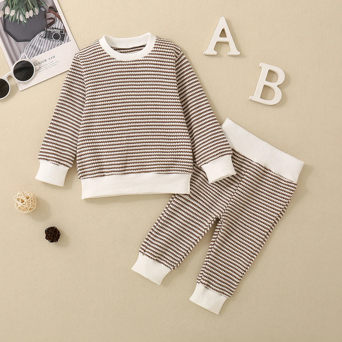 Neutral Brown Spring Autumn Baby Outfit Long Sleeve Striped Pocket Top And Pants Two-Piece Set for Infants And Toddlers
Neutral Brown Spring Autumn Baby Outfit Long Sleeve Striped Pocket Top And Pants Two-Piece Set for Infants And Toddlers