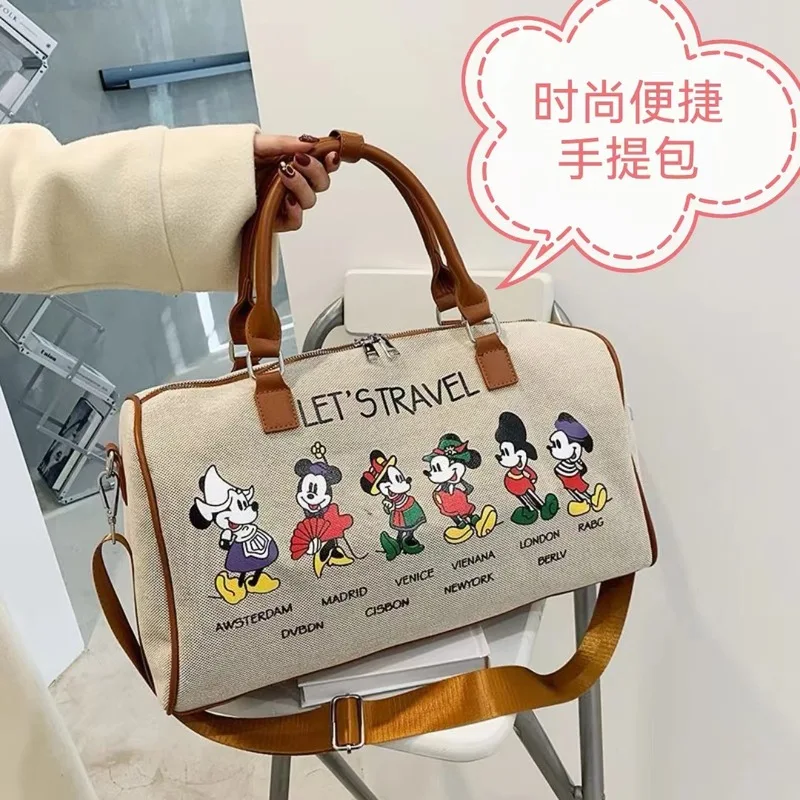 Новая модель сумки Disney с Микки Маусом, большая вместительная портативная дорожная спортивная сумка, сумка через плечо, унисекс, с анимационным дизайном, для мужчин и женщин
Новая модель сумки Disney с Микки Маусом, большая вместительная портативная дорожная спортивная сумка, сумка через плечо, унисекс, с анимационным дизайном, для мужчин и женщин