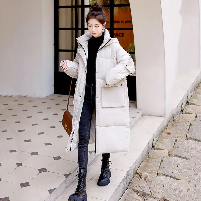 2023 New Winter Jacket Women ' s Parka Snow Wear Coat Hooded Thicken Warm Down Cotton Coats Loose Jacket Long Parkas Outerwear
2023 New Winter Jacket Women ' s Parka Snow Wear Coat Hooded Thicken Warm Down Cotton Coats Loose Jacket Long Parkas Outerwear