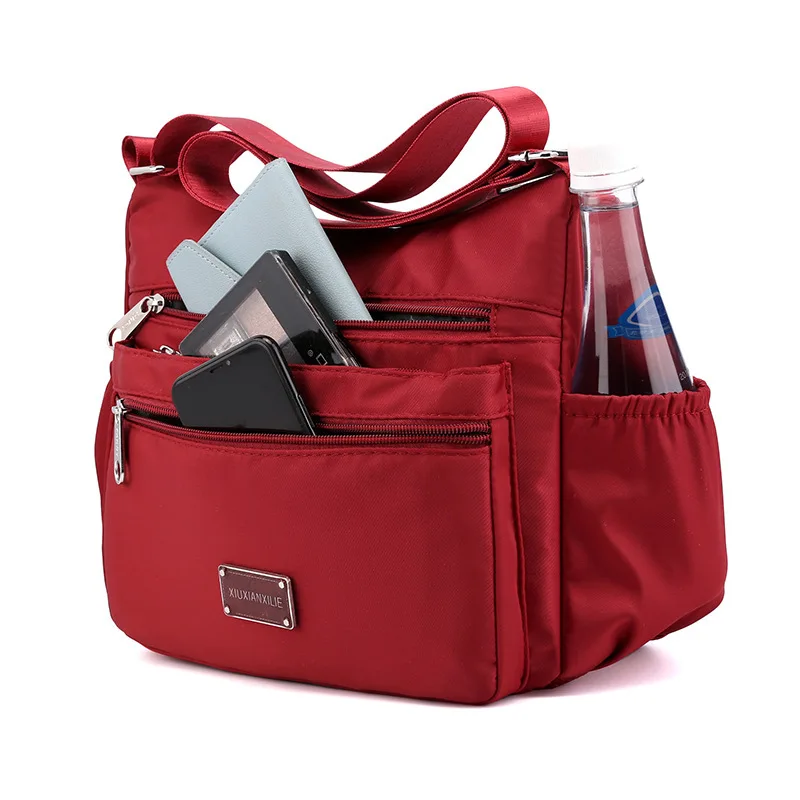 New style neutral nylon fabric ladies' handbag Oxford cloth shoulder strap crossbody bag travel bag multi-compartment casual bag
New style neutral nylon fabric ladies' handbag Oxford cloth shoulder strap crossbody bag travel bag multi-compartment casual bag