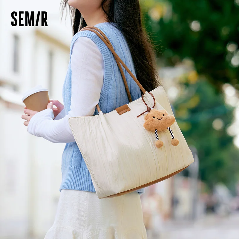 Женская большая сумка Semir, новинка 2025, стильная сумка через плечо большой вместимости, сумка с непринужденной атмосферой, популярная
Женская большая сумка Semir, новинка 2025, стильная сумка через плечо большой вместимости, сумка с непринужденной атмосферой, популярная