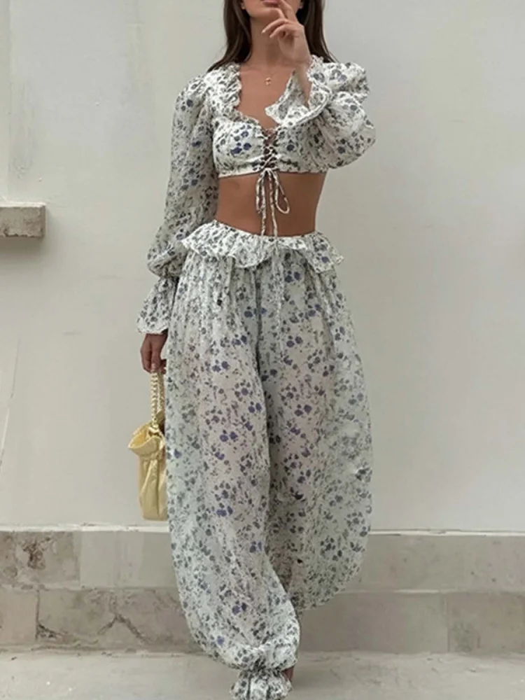 Blue Floral Wide Leg Pants Set Women High Waist Sheer Ruffle Hem Trousers 2026 New Fashion Vacation Beach Casual Outfits 2026
Blue Floral Wide Leg Pants Set Women High Waist Sheer Ruffle Hem Trousers 2026 New Fashion Vacation Beach Casual Outfits 2026