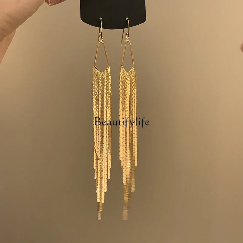 Golden Wheat Wave~ French Gold Long Chain Tassel Earrings Light Luxury Temperament
Golden Wheat Wave~ French Gold Long Chain Tassel Earrings Light Luxury Temperament