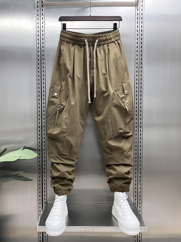 Мужские повседневные брюки карго на весну-лето, свободные широкие брюки с молнией, модные драпированные рабочие брюки, молодежный стиль
Мужские повседневные брюки карго на весну-лето, свободные широкие брюки с молнией, модные драпированные рабочие брюки, молодежный стиль