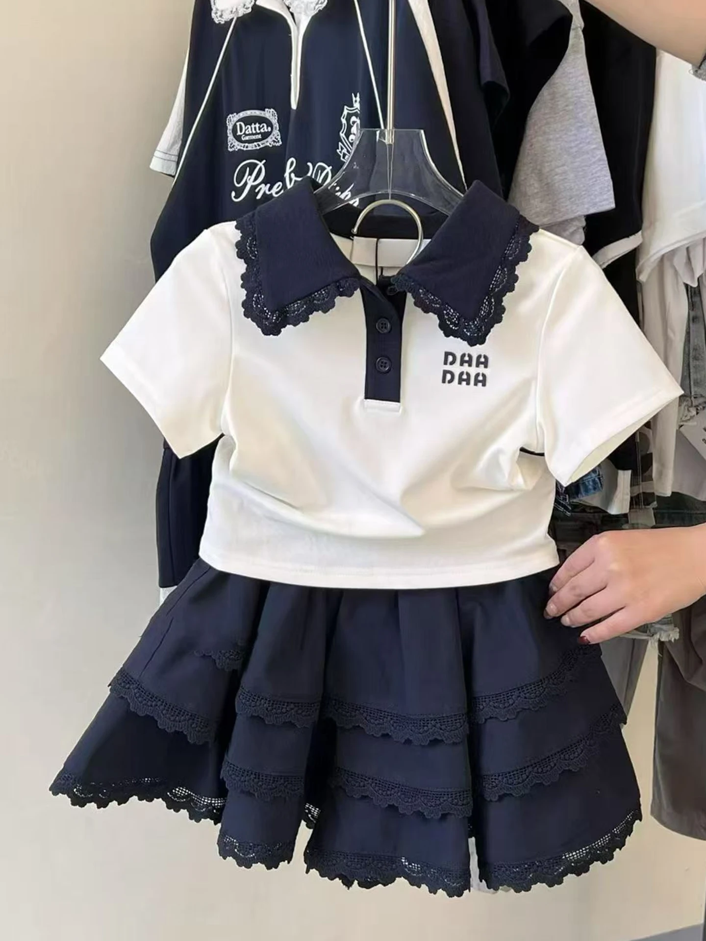 Girls Summer Outfit 2026 New School Style Ruffle Shirt Half Skirt Fashionable Two Piece Set Children's Clothing Set
Girls Summer Outfit 2026 New School Style Ruffle Shirt Half Skirt Fashionable Two Piece Set Children's Clothing Set