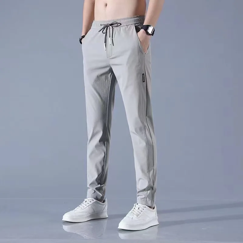 New Casual Long Pants Men's Straight Loose Air Conditioning Trousers Men's Summer Ice Silk Slim Sports Pants
New Casual Long Pants Men's Straight Loose Air Conditioning Trousers Men's Summer Ice Silk Slim Sports Pants