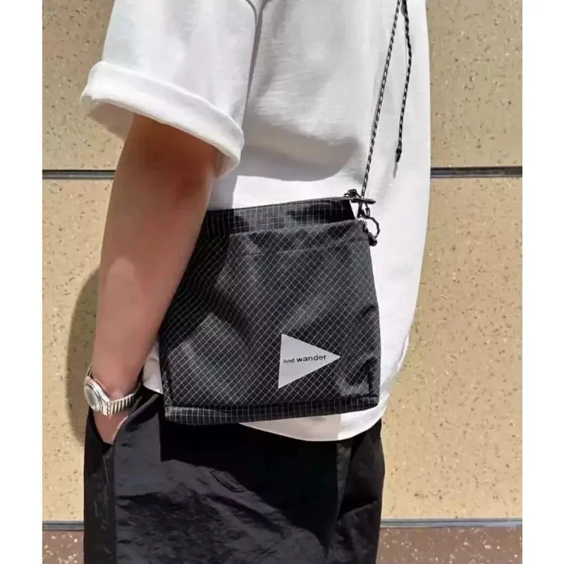 Water-repellent Nylon Crossbody Bag Japanese Fashion Brand Reflective Plaid Rip Stop Lightweight Drawstring Casual Shoulder Bag
Water-repellent Nylon Crossbody Bag Japanese Fashion Brand Reflective Plaid Rip Stop Lightweight Drawstring Casual Shoulder Bag